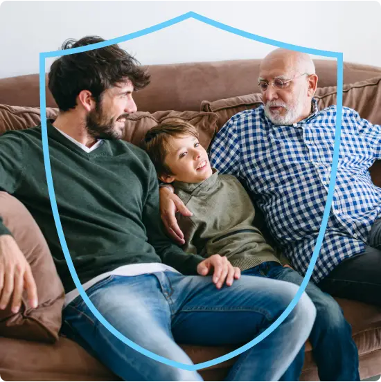 Image - A father, son, and grandfather relaxing on a couch.