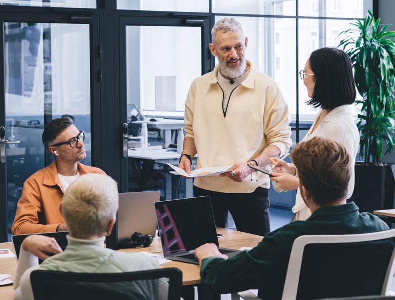 Image - Team meeting in an office.